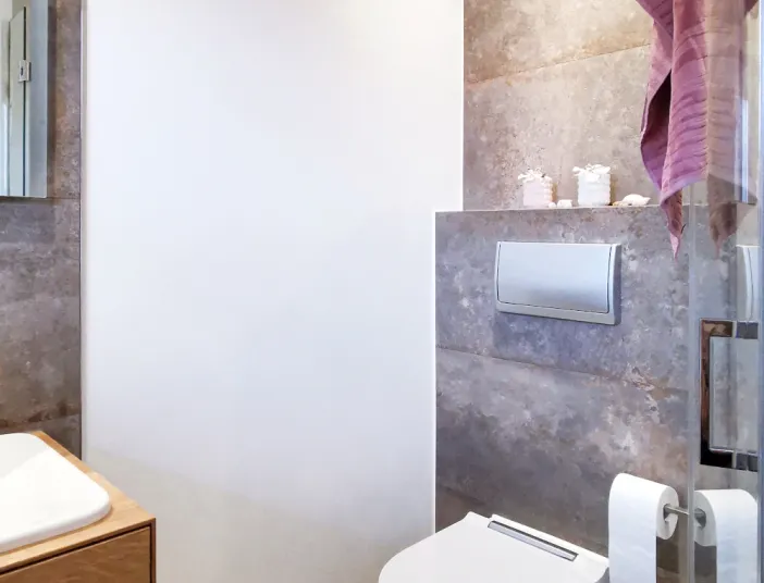 Bild eines WC in einem Gästebad.